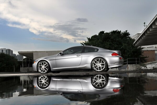 Grey BMW with reflection