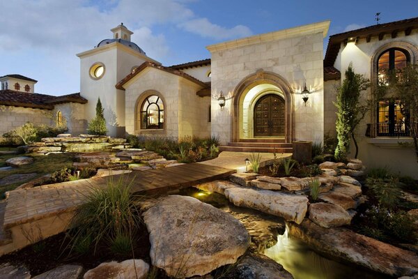 Unusual architecture. A stream among the stones