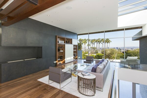 The interior of the living room in the house in calm colors