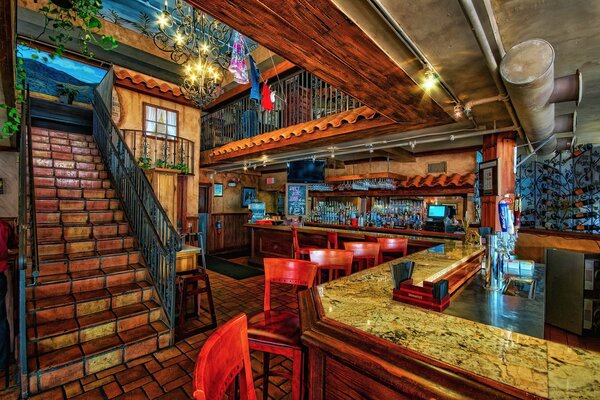 Photo de l intérieur du bar avec escalier