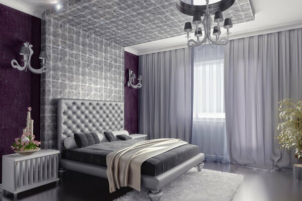 Camera da letto nei toni del grigio con tappeto bianco