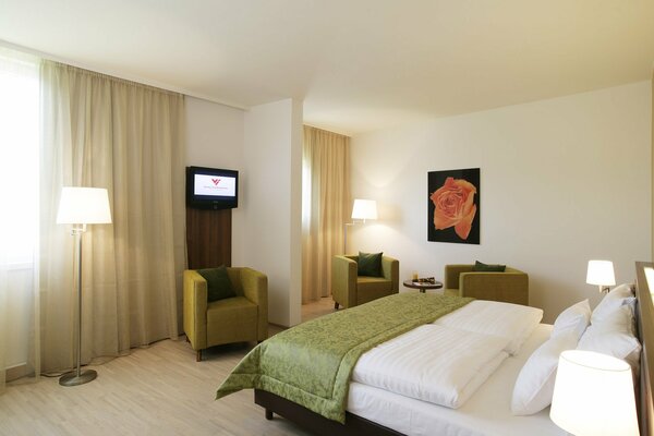Pokój hotelowy z Zielonym łóżkiem