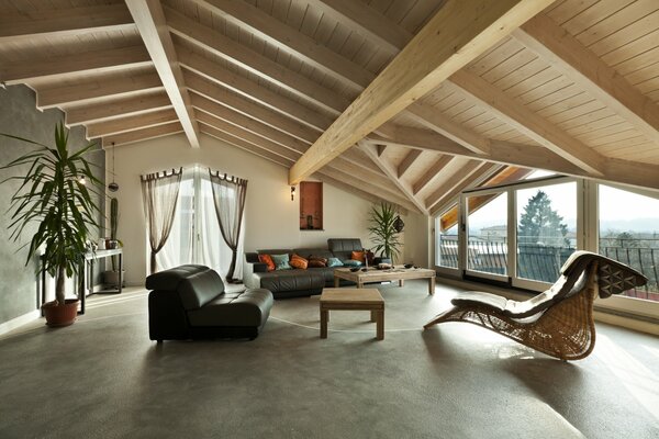 Beautiful design of the attic room in ethnic style