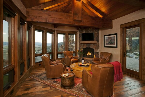 Photo of the window design . interior fireplace and armchair 