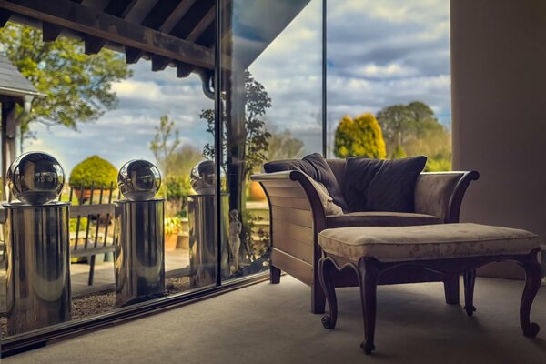 Interior of the room armchair by the window