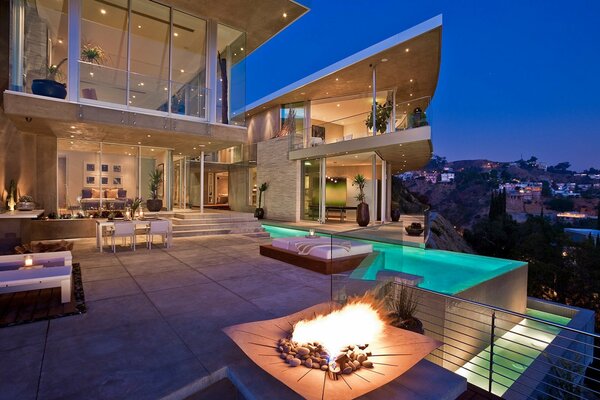 Interior and landscape of a house with a swimming pool