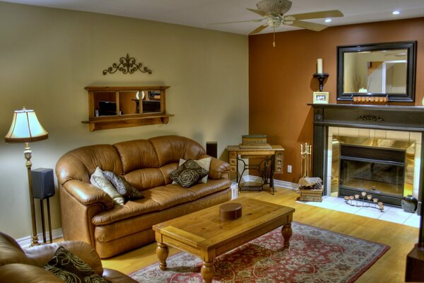 Living room with fireplace, carpet and mirror