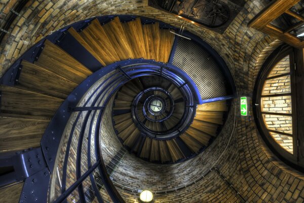 Spiral staircase in the tower with brickwork