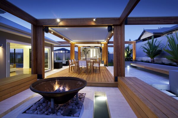 Stylish interior of the dining room with a barbecue