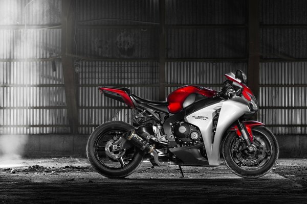 A tuned motorcycle on a dark background