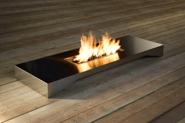 Modern outdoor fireplace with open fire