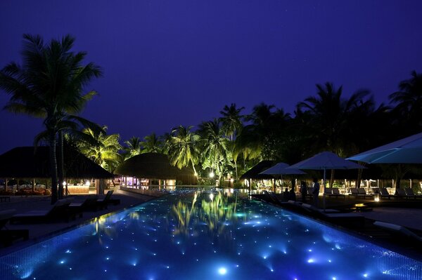 At night in the Maldives, the pool is deserted