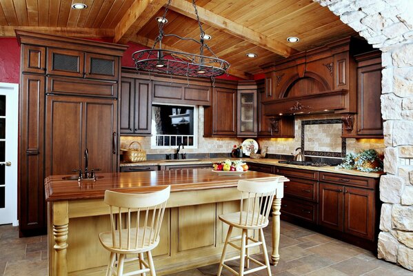 Wooden kitchen with stone wall