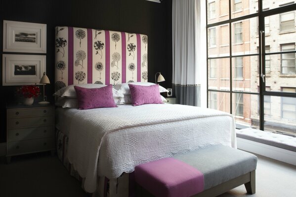 A large bed in the bedroom interior