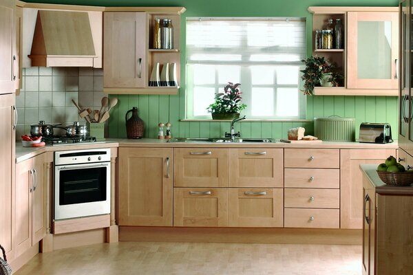 Kitchen in beige and green tones