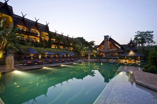 The pool area on the adjacent territory of the hotel