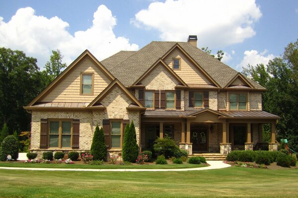 Country house with a green lawn