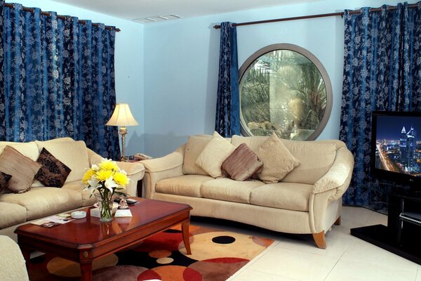 Interior of the hall with blue curtains