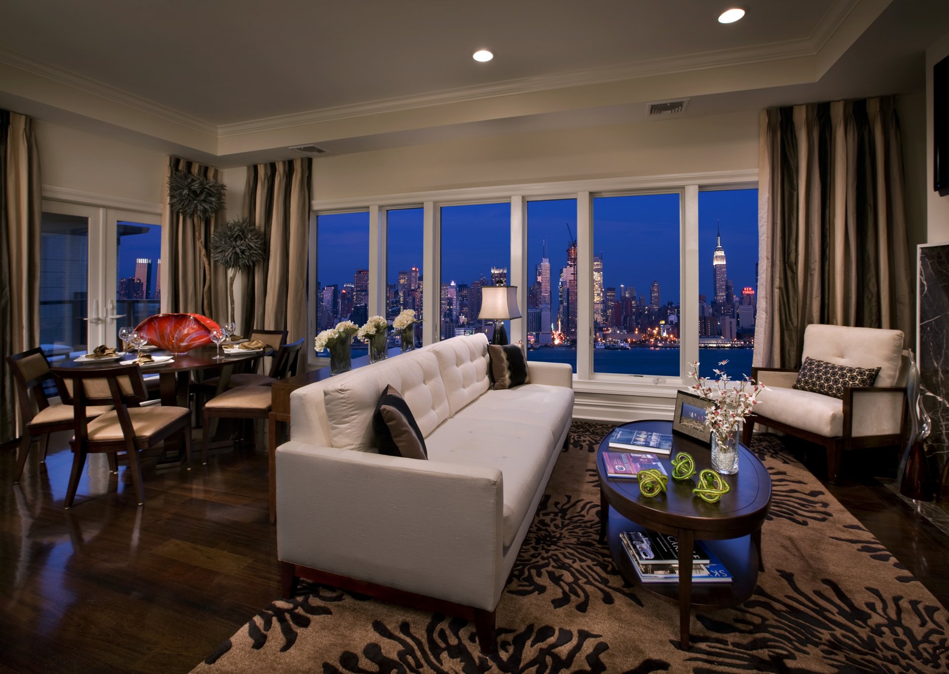 apartment suite penthouse room interior table sofa window new york city buildings night skyscrapers metropolis usa wallpaper