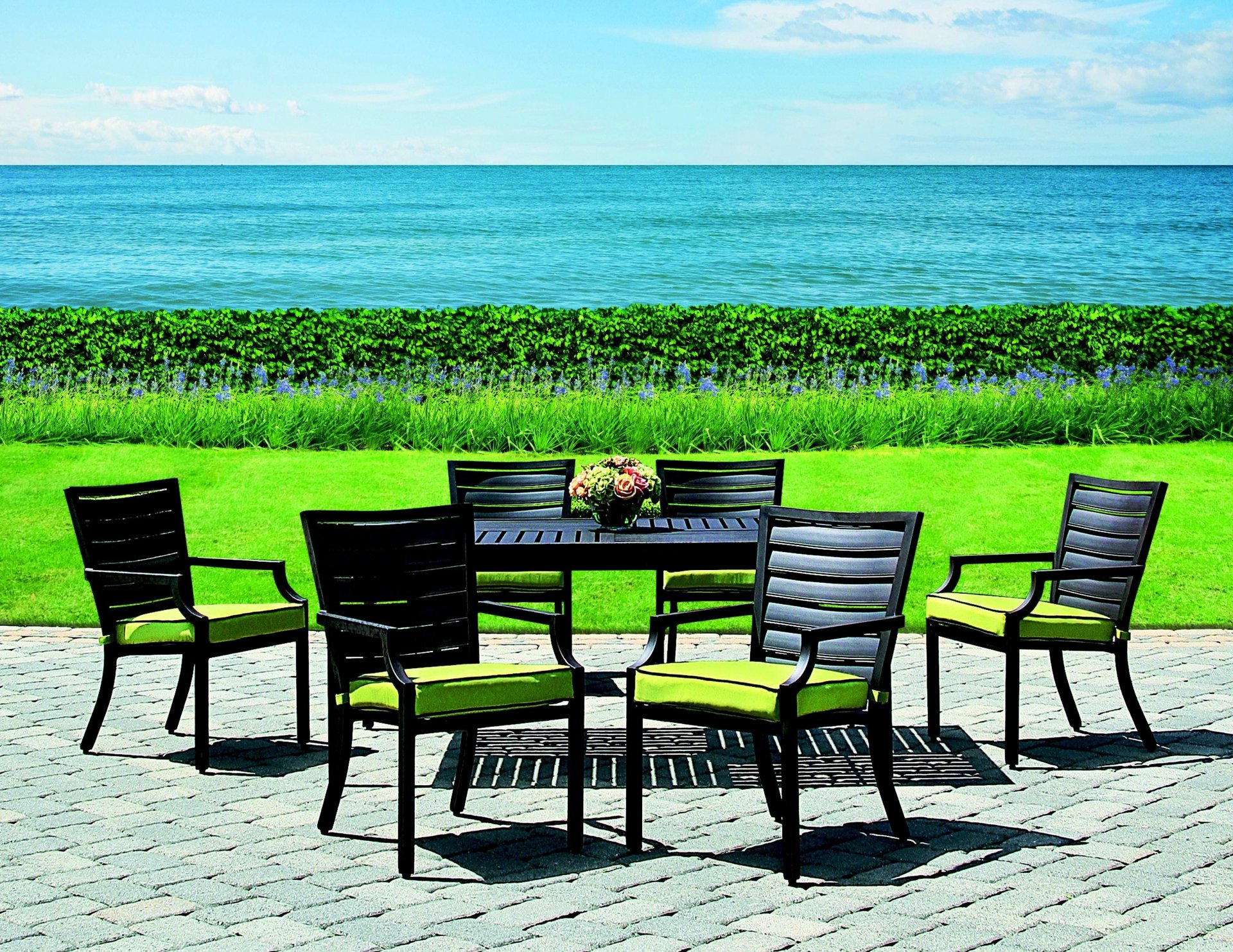 interior design table chairs green grass turf nature sea. ocean water