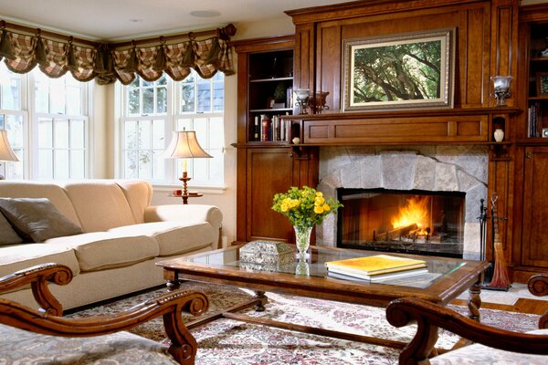 Interior of the house with fireplace and sofa