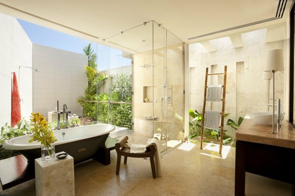 Cozy bathroom interior decorated with flowers