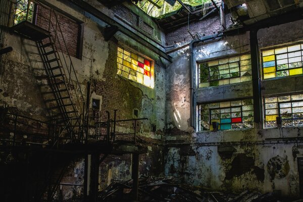 An abandoned building with colored debris