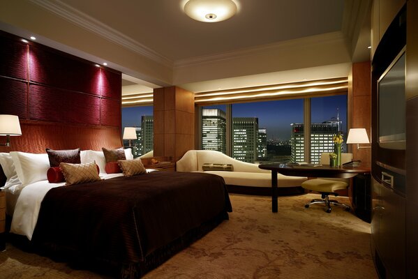 Cozy Bedroom with a view of the city