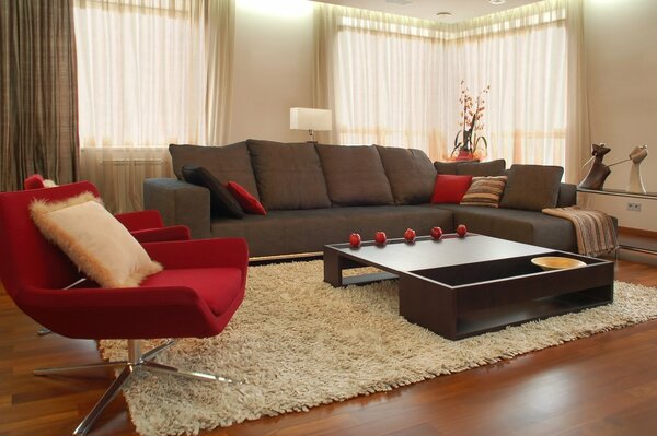 Large living room with sofa and carpet