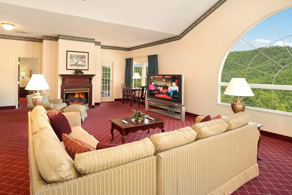 Villa living room design with large windows