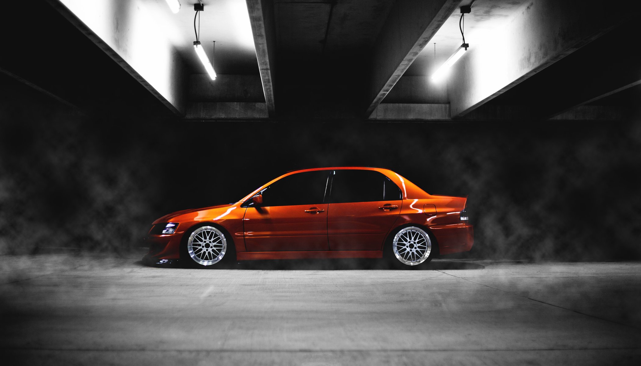 mitshubishi tuning orange bas côté lancer ix evo evolution