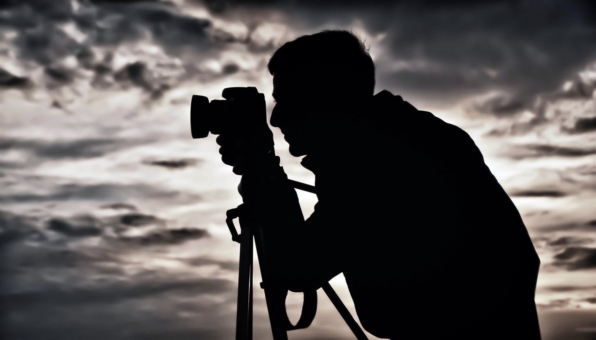 male tripod background photographer silhouette the camera