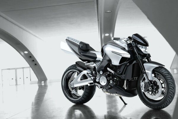 A beautiful silver-black big motorcycle on a futuristic background