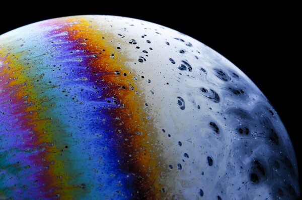 Beautiful multicolored planet on a black background