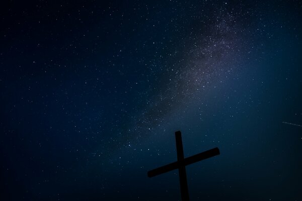 Cross on the background of the starry sky
