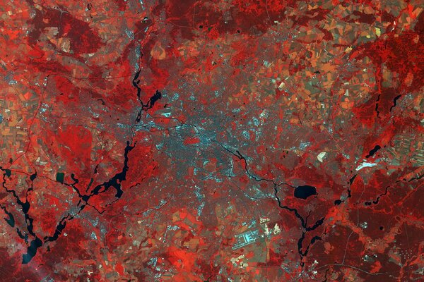 La tierra desde el espacio abstracto en tonos rojos