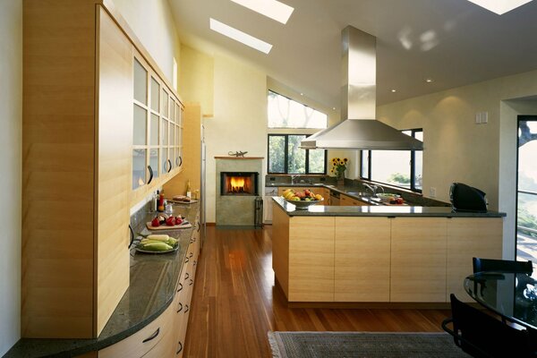 Design of a light kitchen with a fireplace