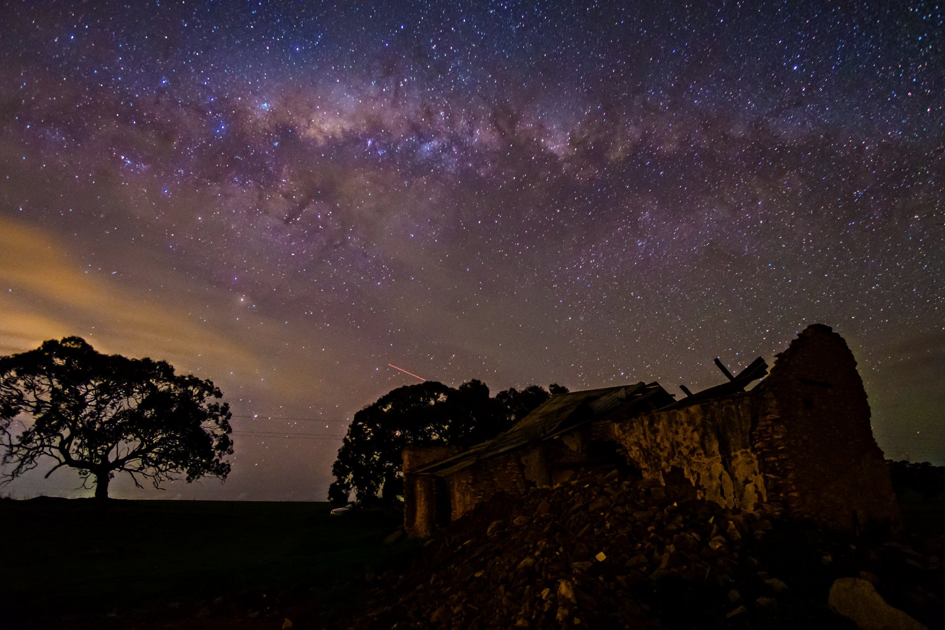 cosmos stars night space milky way trees ruin