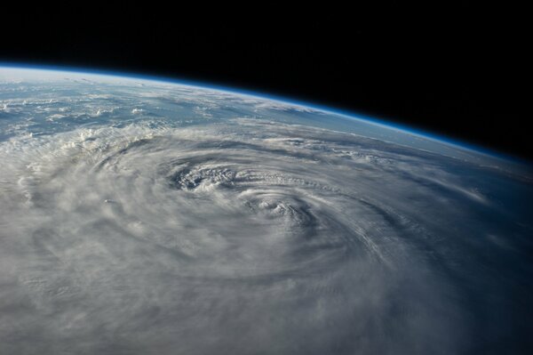 Typhoon on planet earth as the space is burning