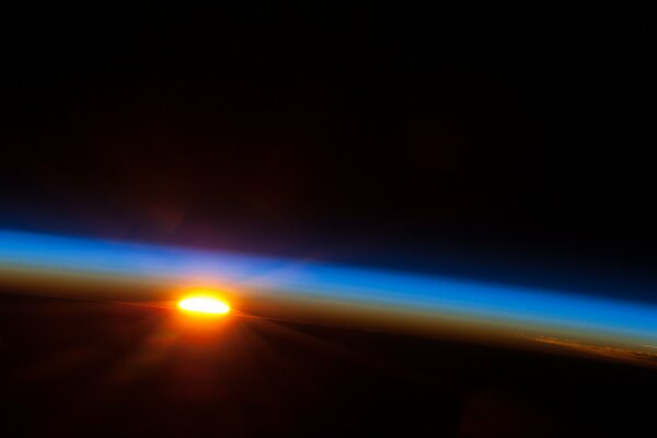 Dawn in space over the Pacific Ocean