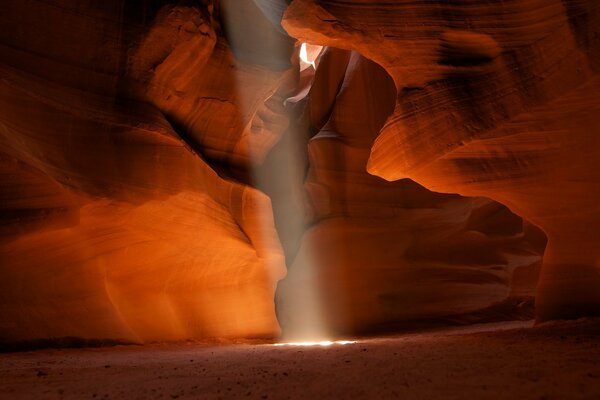 A sunbeam from a sandy cave