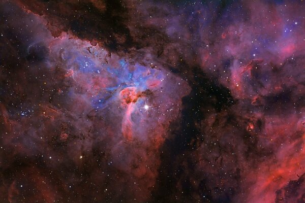 Nebulosa azul y rosa en el espacio oscuro
