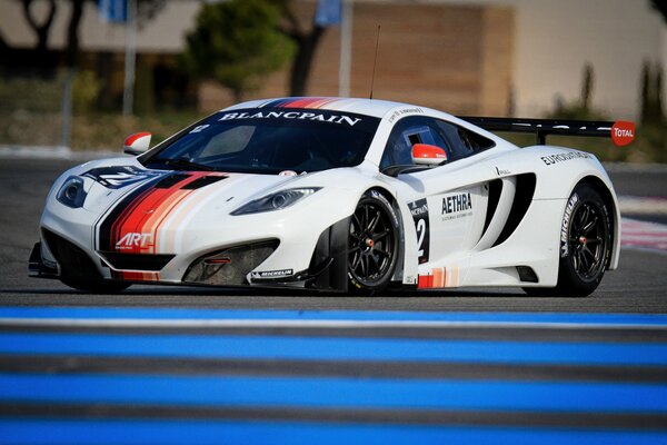 White sports car on the road