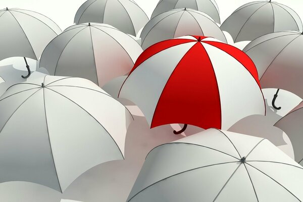 Bright red striped umbrella on a white background