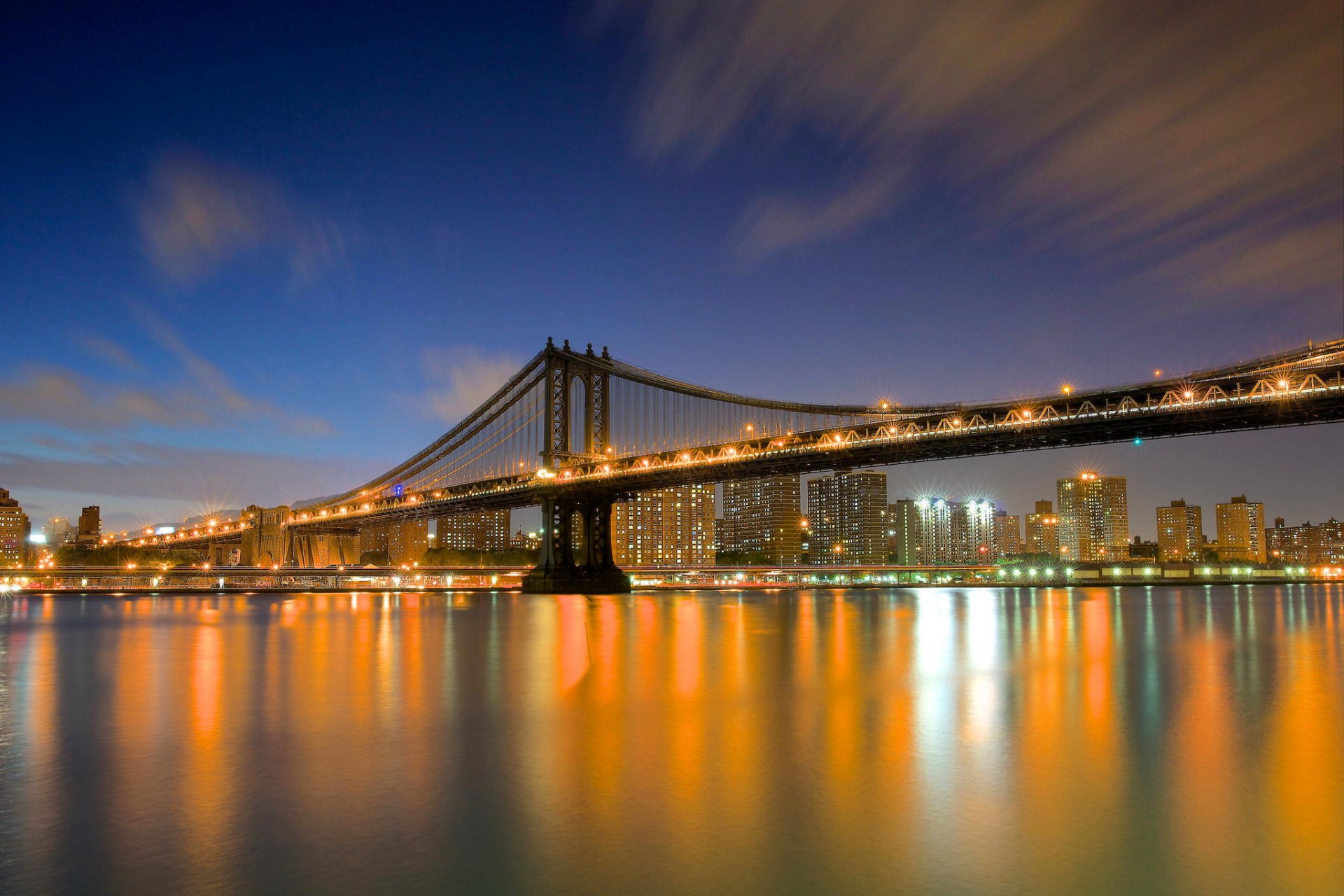 nueva york estados unidos ciudad noche luces rascacielos edificios casas río puente