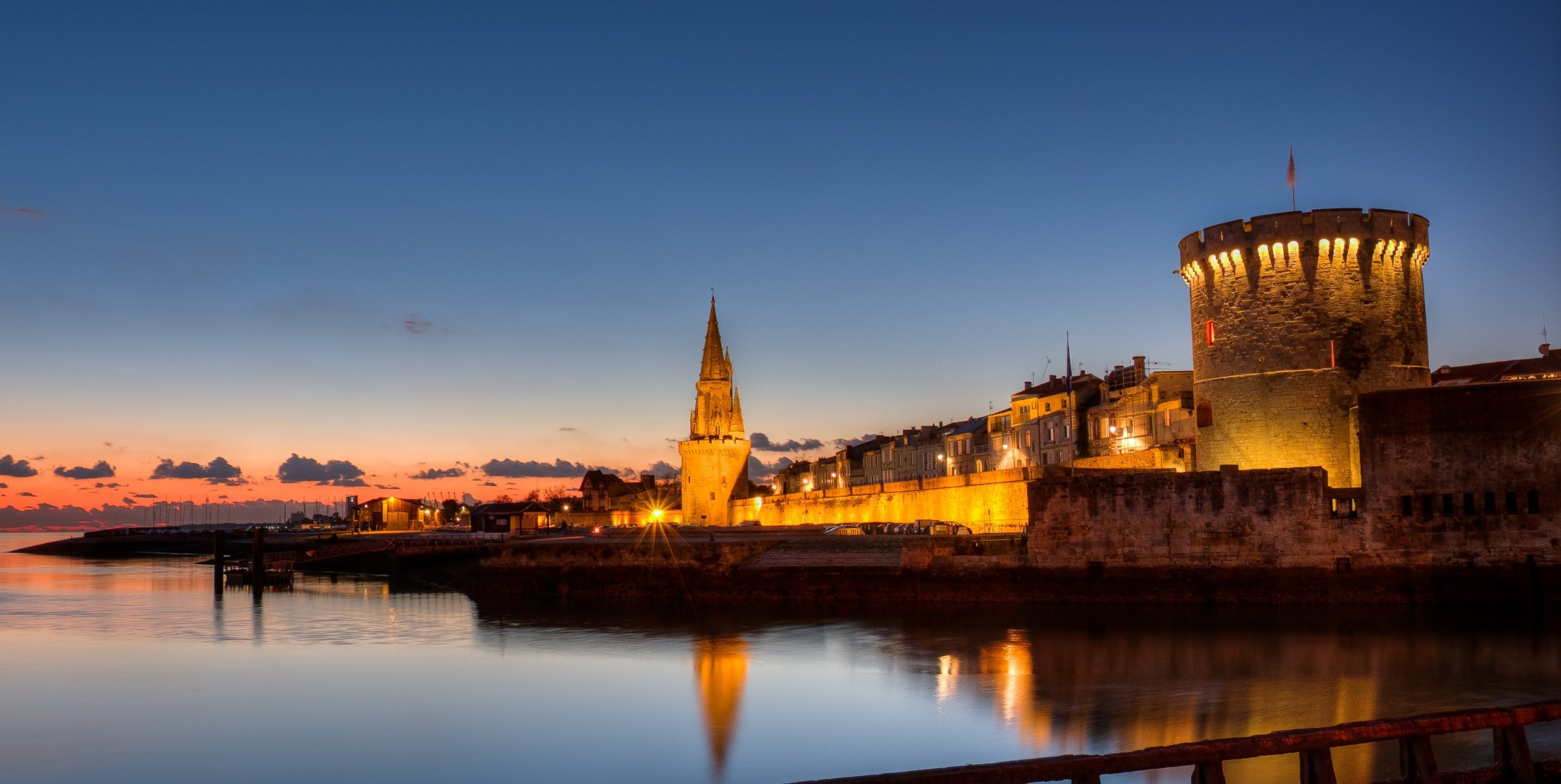 la rochelle poitou-charente esplanade st jean d acre france la rochelle city poitou-charente region fortress architecture coast bay evening light