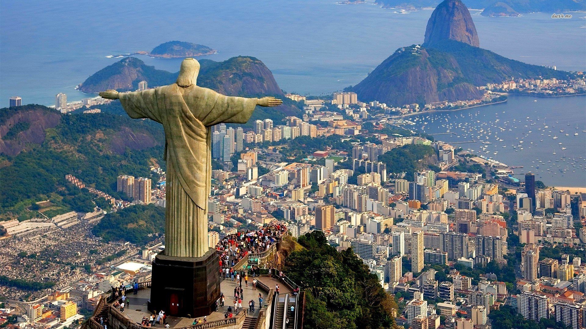 rio de janeiro brazylia góra posąg chrystus morze domy zatoka