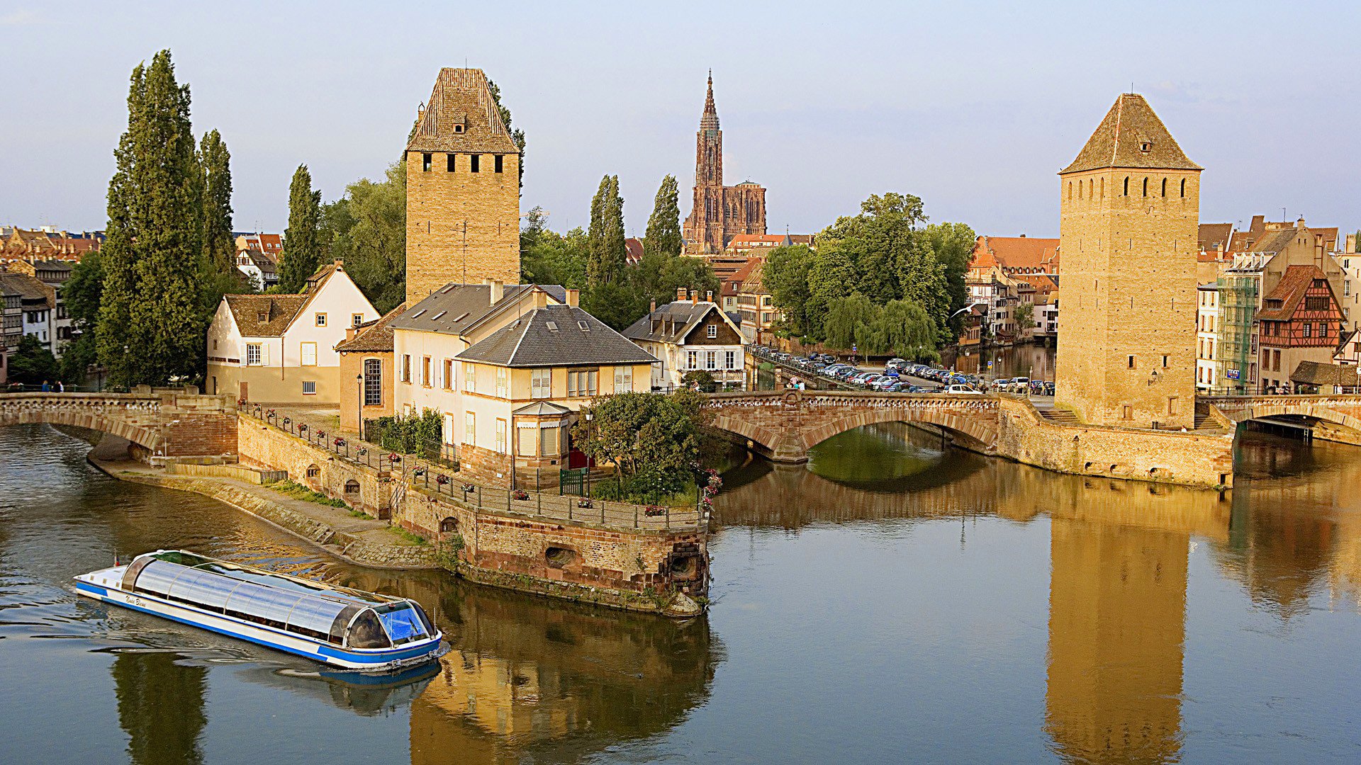 trasbourg france sky river channel bridge house tower church cathedral ship tree