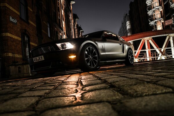 Matte mustang, evening city streets