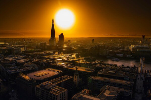 Sunrise over the roofs of houses in London